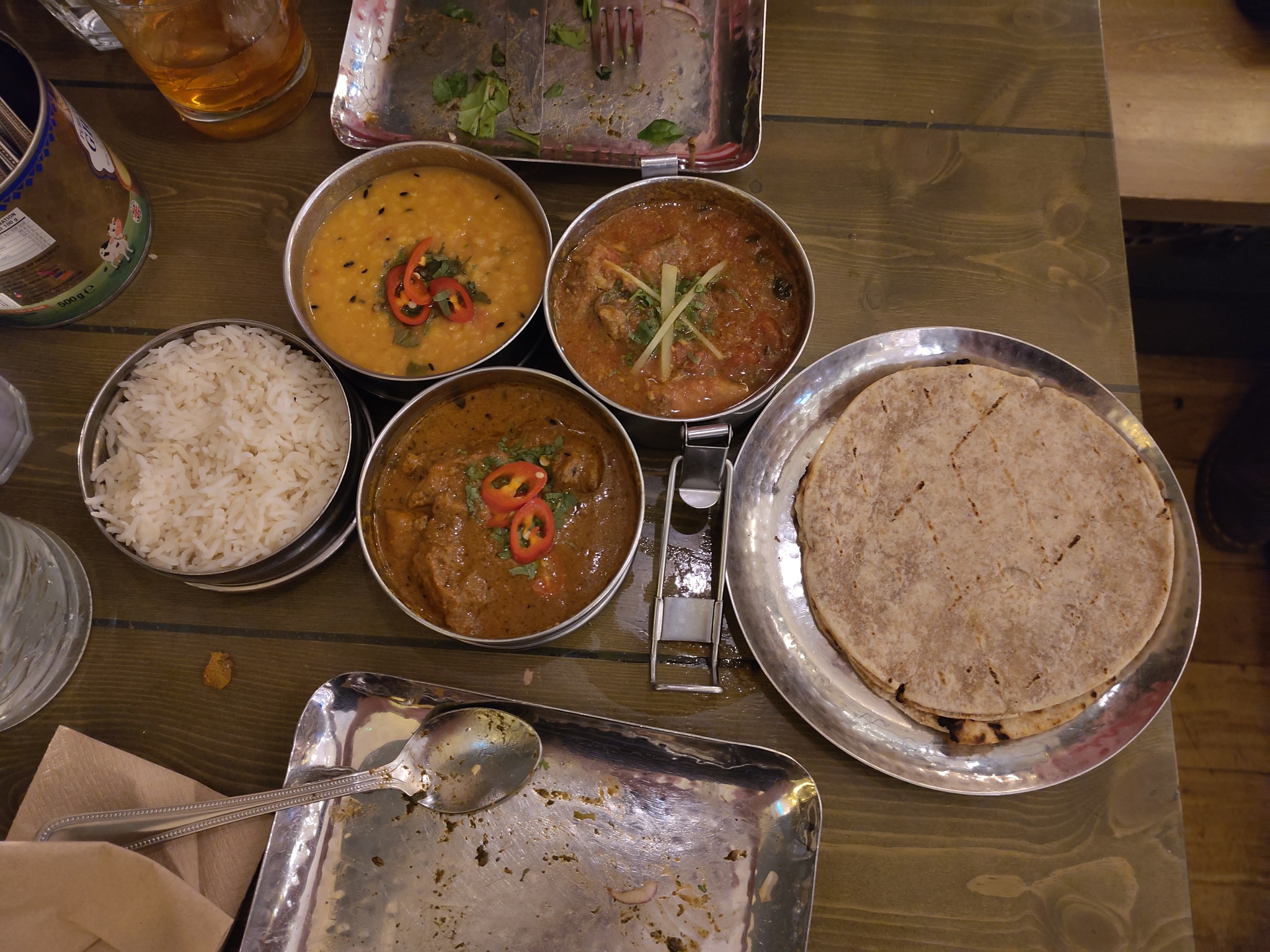 Rice; Butter Chicken, Temple Dahl, and Agra Ginger Chicken); and Roti